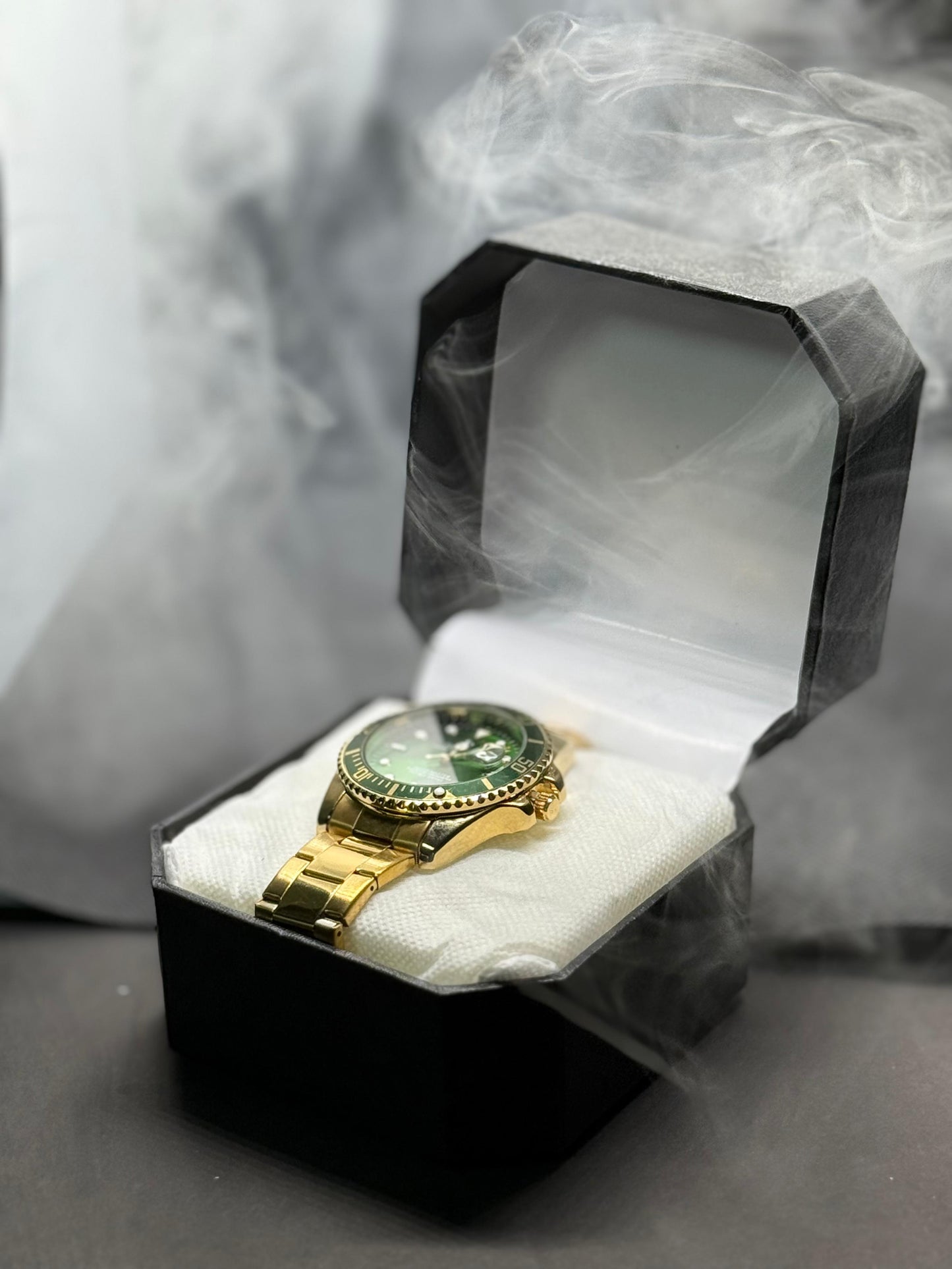 Rolex GMT Master II Gold & Green Luxury Watch in rotating dial