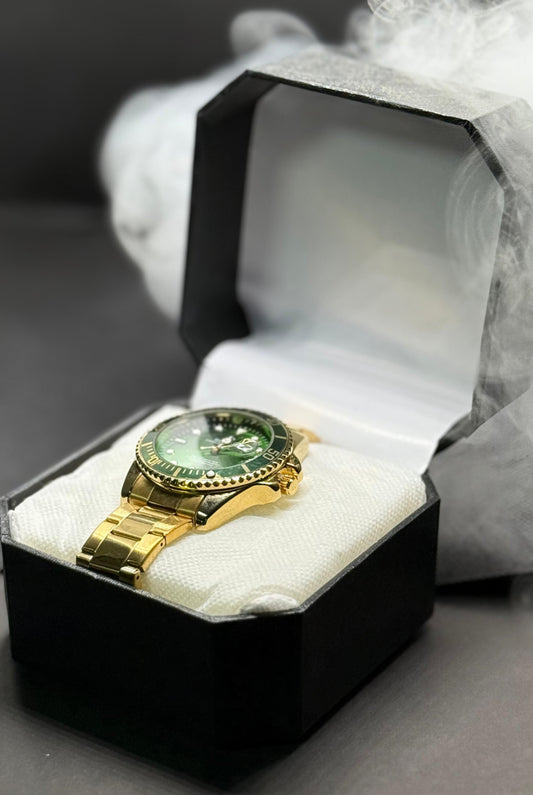 Rolex GMT Master II Gold & Green Luxury Watch in rotating dial