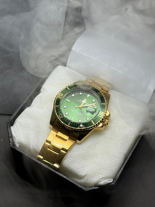 Rolex GMT Master II Gold & Green Luxury Watch in rotating dial